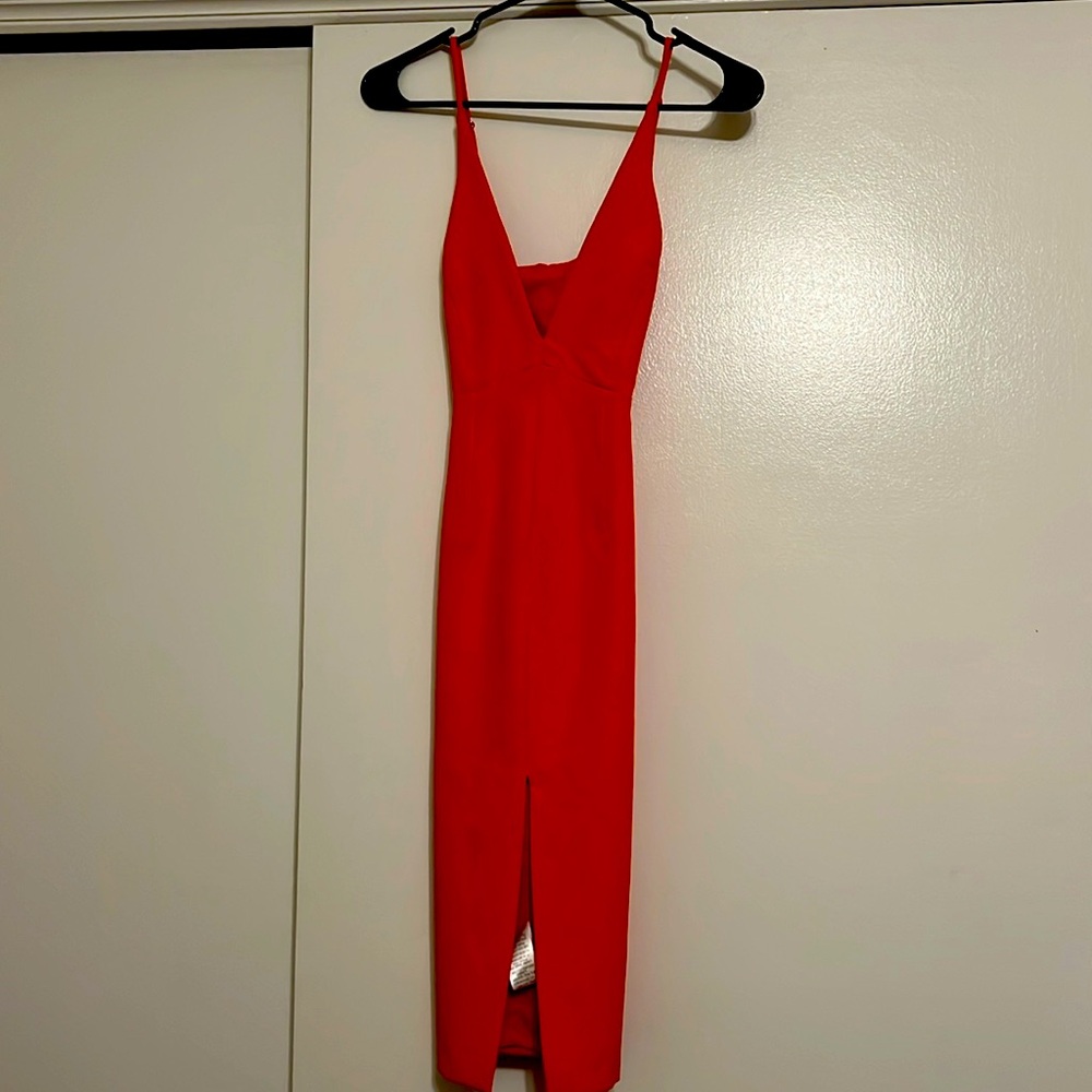 Dark orange plunge L’ASTISTE dress with front slit
